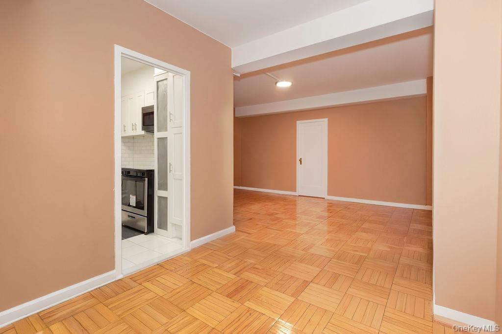 1970 E Tremont Avenue Unit: 1C thumbnail 2